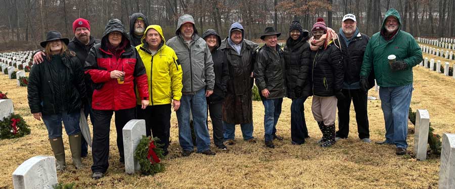 Marcone employees honoring fallen soldiers with wreaths